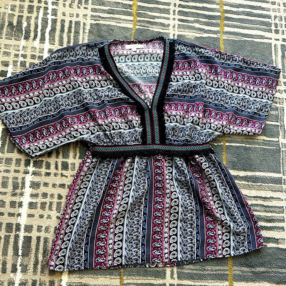 Like NEW boho style top it can also work as a swim suit cover up very pretty